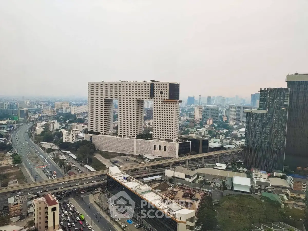 Stunning cityscape view featuring a unique architectural building and bustling urban environment.