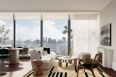 Luxurious living room with panoramic city view, elegant furniture, and modern decor.