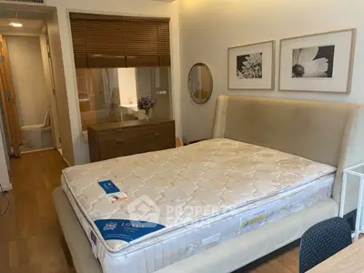 Cozy bedroom with elegant decor and comfortable mattress, perfect for relaxation.
