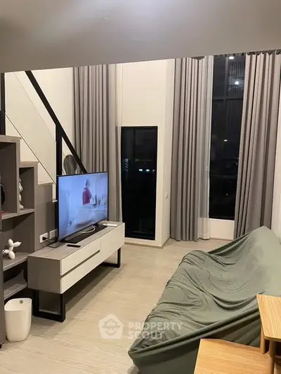 Modern living room with high ceilings and stylish decor