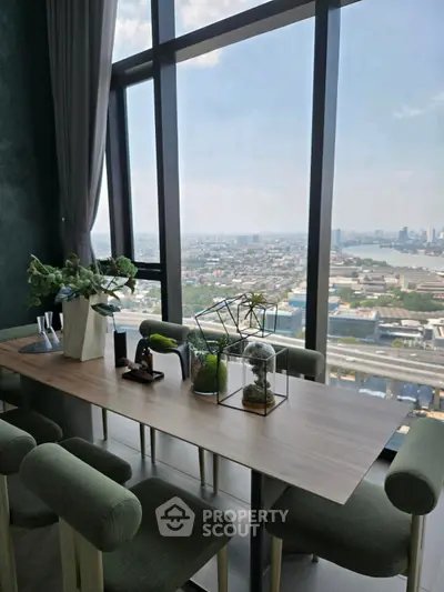 Stunning dining area with panoramic city view and elegant decor