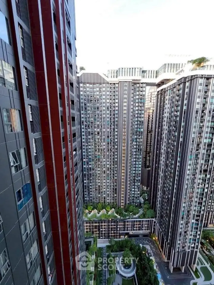 Stunning high-rise residential buildings with lush greenery and modern architecture.