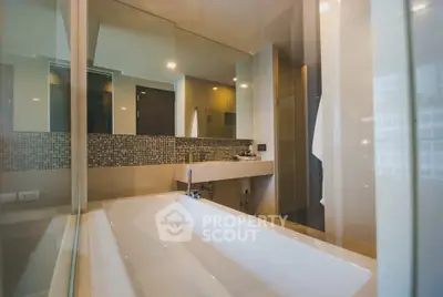 Luxurious modern bathroom with sleek design and spacious bathtub