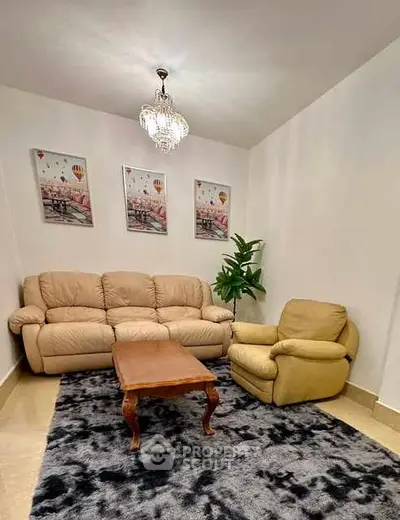 Cozy living room with plush seating and elegant decor