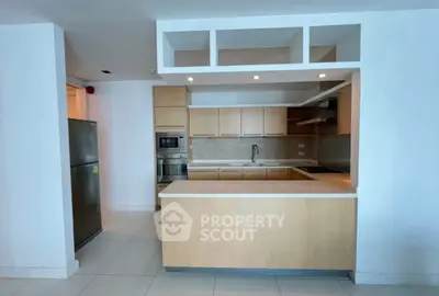 Modern kitchen with open layout and stainless steel appliances