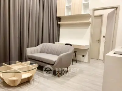 Modern living room with stylish sofa and unique coffee table in elegant apartment.