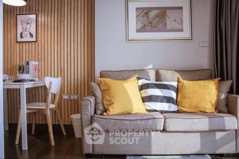 Chic living room with cozy sofa and stylish decor in modern apartment