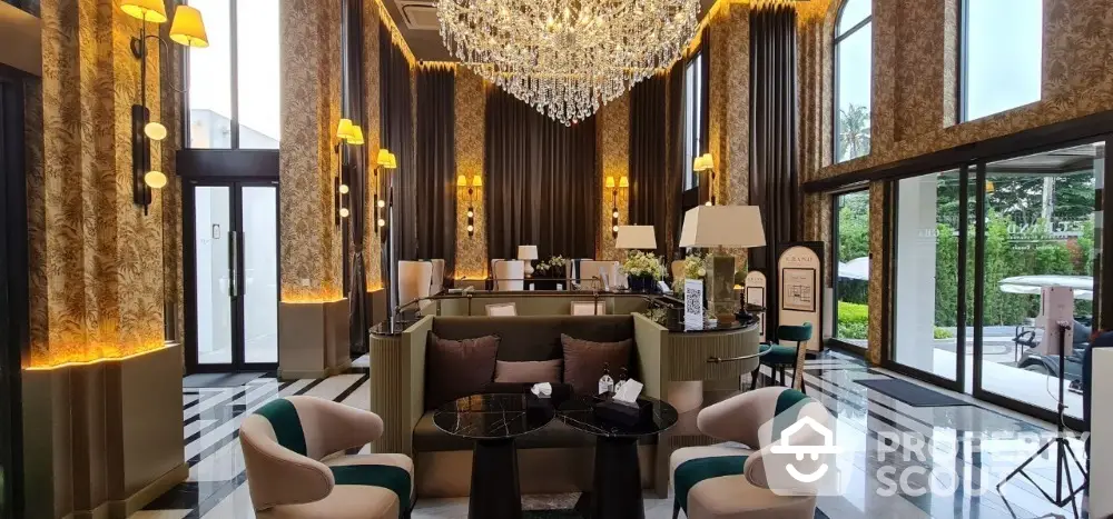 Luxurious hotel lobby with elegant chandelier and modern decor