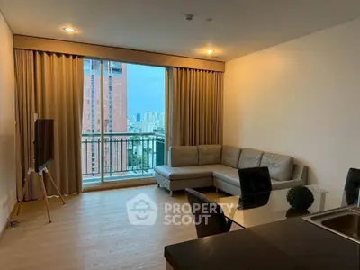 Modern living room with city view and stylish furniture