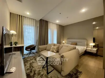 Modern living room with cozy beige sofa and stylish decor