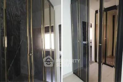 Luxurious modern closet with mirrored doors and sleek design