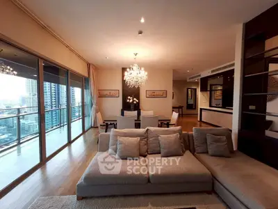 Luxurious living room with spacious balcony and stunning city view