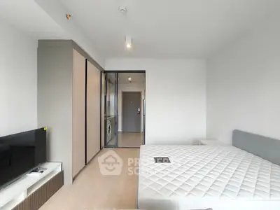 Modern bedroom with minimalist design and built-in storage