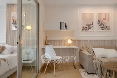 Modern cozy living room with stylish decor and adjacent bedroom view