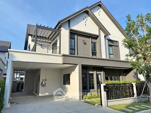 Modern two-story house with spacious driveway and elegant facade