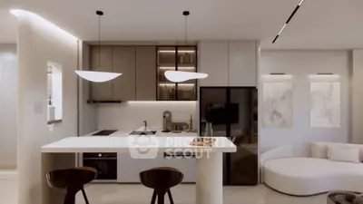 Modern kitchen with sleek design and open layout, featuring stylish lighting and contemporary furniture.