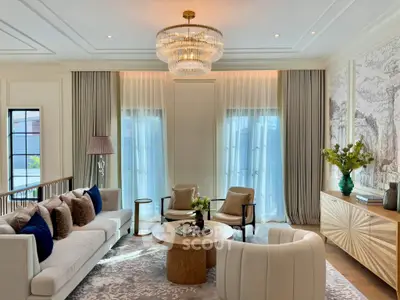Luxurious living room with elegant chandelier and stylish decor