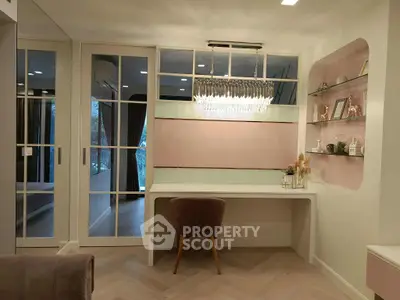 Elegant study area with modern chandelier and stylish decor