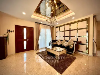 Luxurious living room with elegant chandelier and modern decor