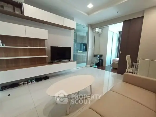 Modern living room with sleek furniture and open layout, perfect for contemporary living.