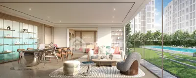 Luxurious living room with modern decor and pool view in upscale apartment