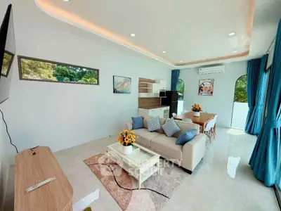 Spacious modern living room with elegant decor and natural light