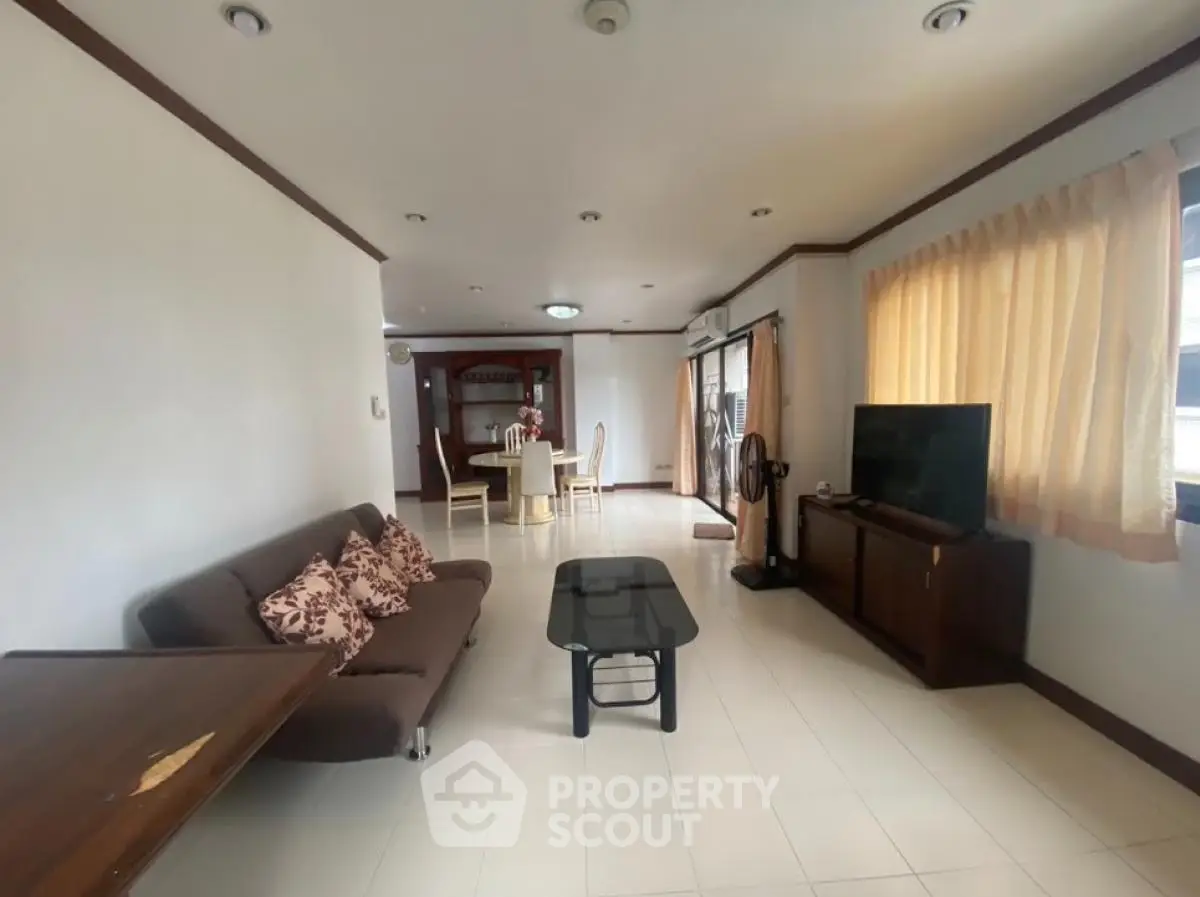 Spacious living room with modern furniture and natural light