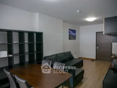 Modern living room with sleek furniture and open layout, perfect for urban living.