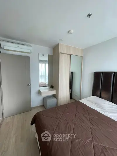 Modern bedroom with sleek design and cozy atmosphere