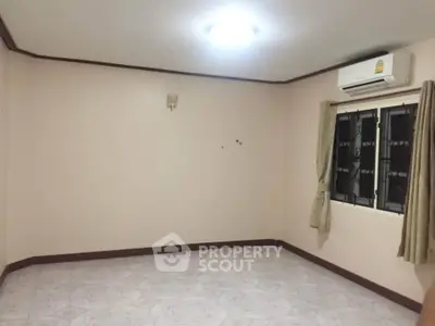 Spacious unfurnished room with air conditioning and tiled flooring, perfect for customization.