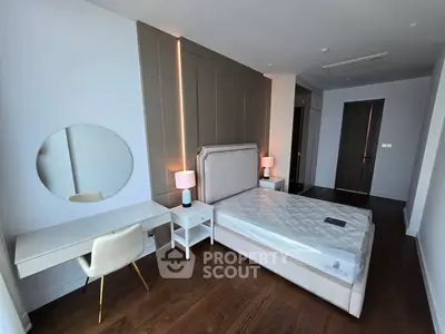 Modern bedroom with stylish decor and natural light