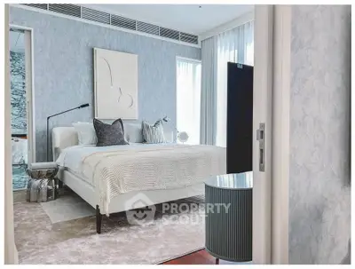 Luxurious modern bedroom with elegant decor and natural light