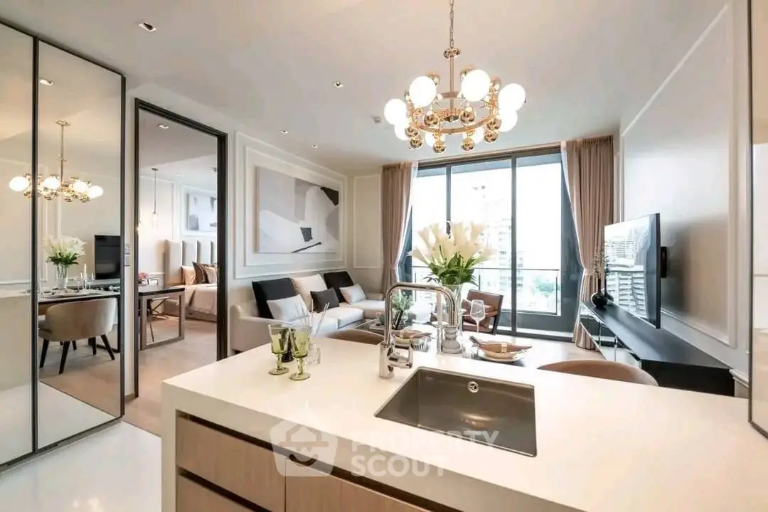 Luxurious open-plan living room with modern kitchen and elegant decor