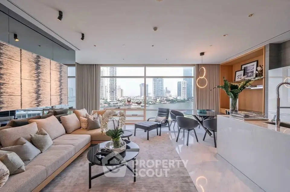 Luxurious modern living room with stunning city view, elegant decor, and open kitchen layout.
