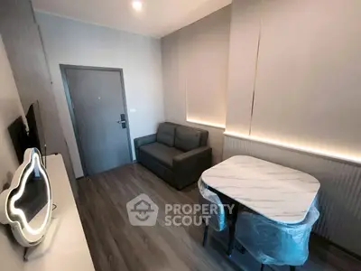 Modern living room with sleek furniture and stylish lighting