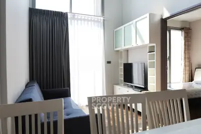 Modern living room with sleek furniture and natural light