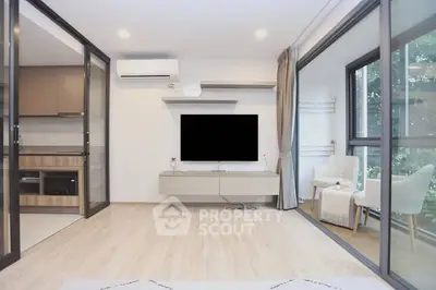 Modern living room with open layout and balcony view