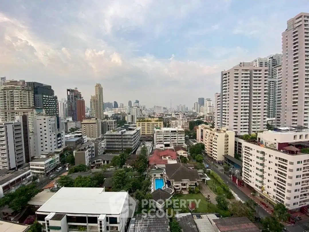 Stunning cityscape view with modern high-rise buildings and lush greenery