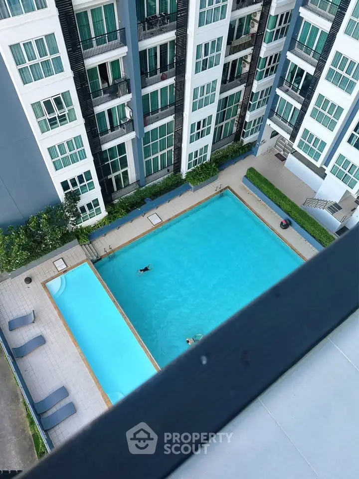 Modern apartment complex with swimming pool view from above