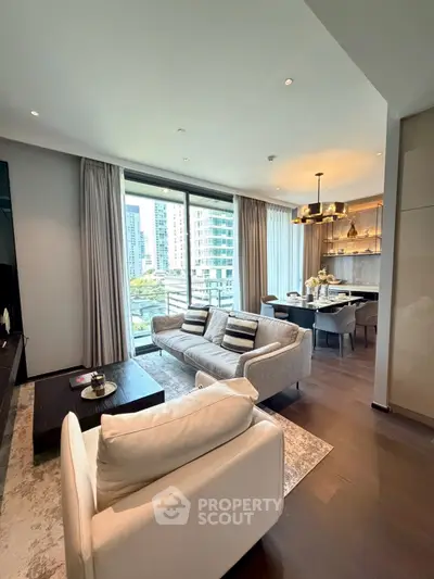 Luxurious modern living room with city view, elegant furniture, and stylish dining area in high-rise apartment.
