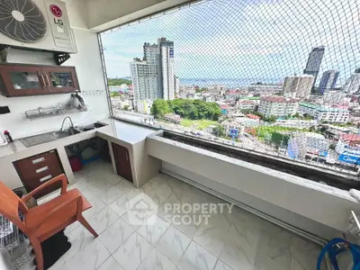 Spacious balcony with stunning city view and modern amenities.