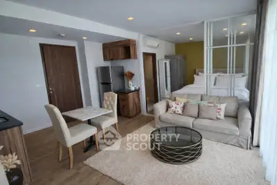 Modern open-plan studio apartment with stylish decor and natural light