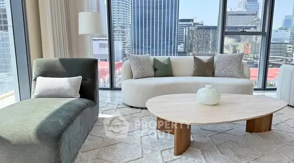 Luxurious modern living room with city view, stylish furniture, and elegant decor.
