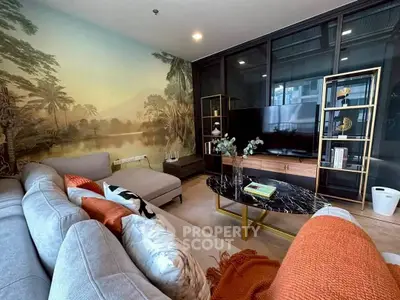 Luxurious living room with elegant decor and scenic mural wall