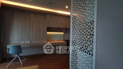 Modern study room with stylish wooden desk and geometric partition