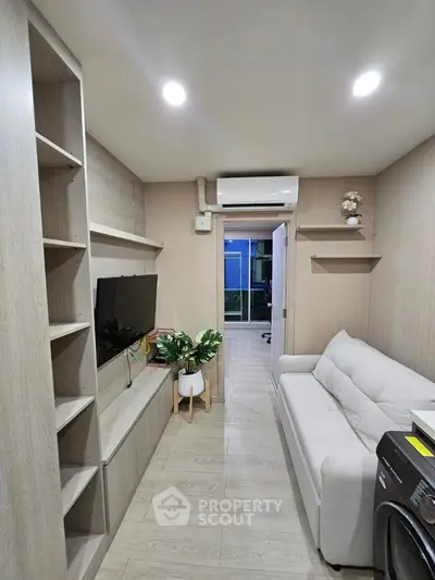 Modern living room with sleek design and built-in storage