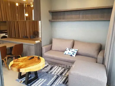 Modern living room with stylish furniture and unique wooden coffee table