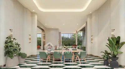 Luxurious dining area with elegant decor and large windows overlooking greenery.