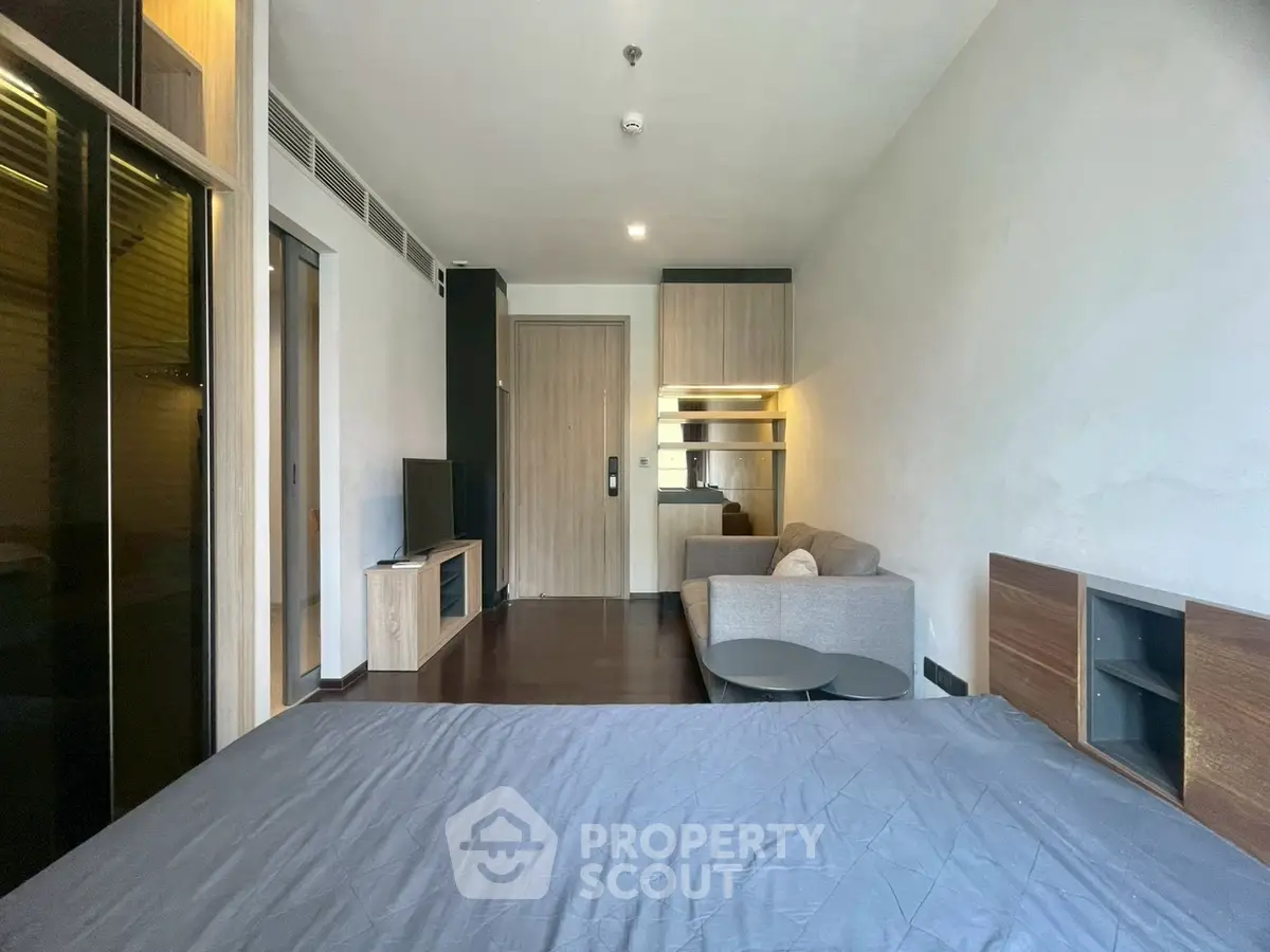 Modern studio apartment with sleek design and cozy living area