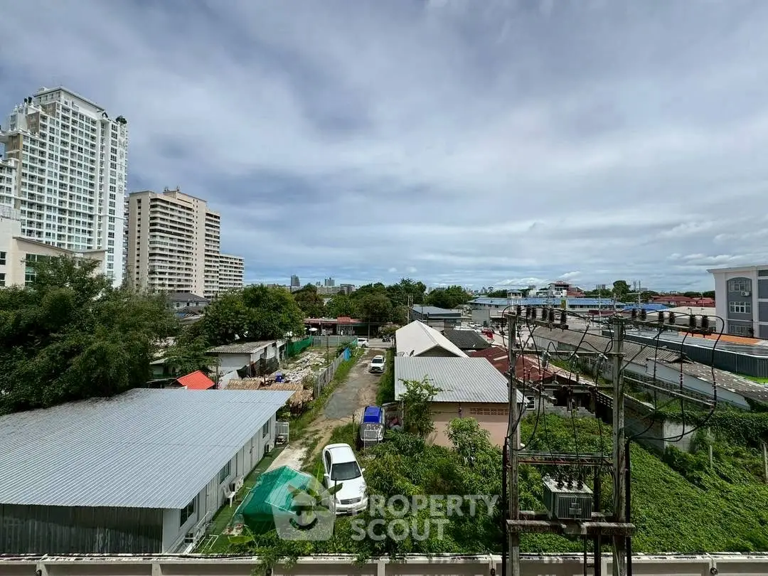 Stunning cityscape view with modern buildings and lush greenery, perfect for urban living enthusiasts.